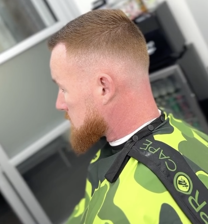 High skin fade with red beard