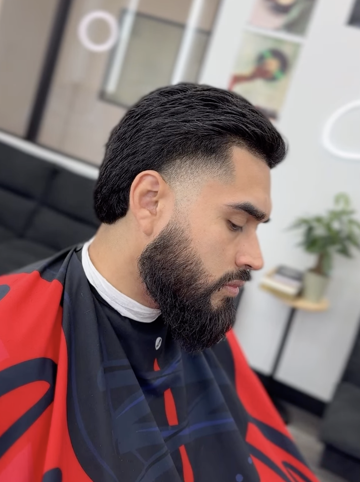 Taper fade with full beard sculpt